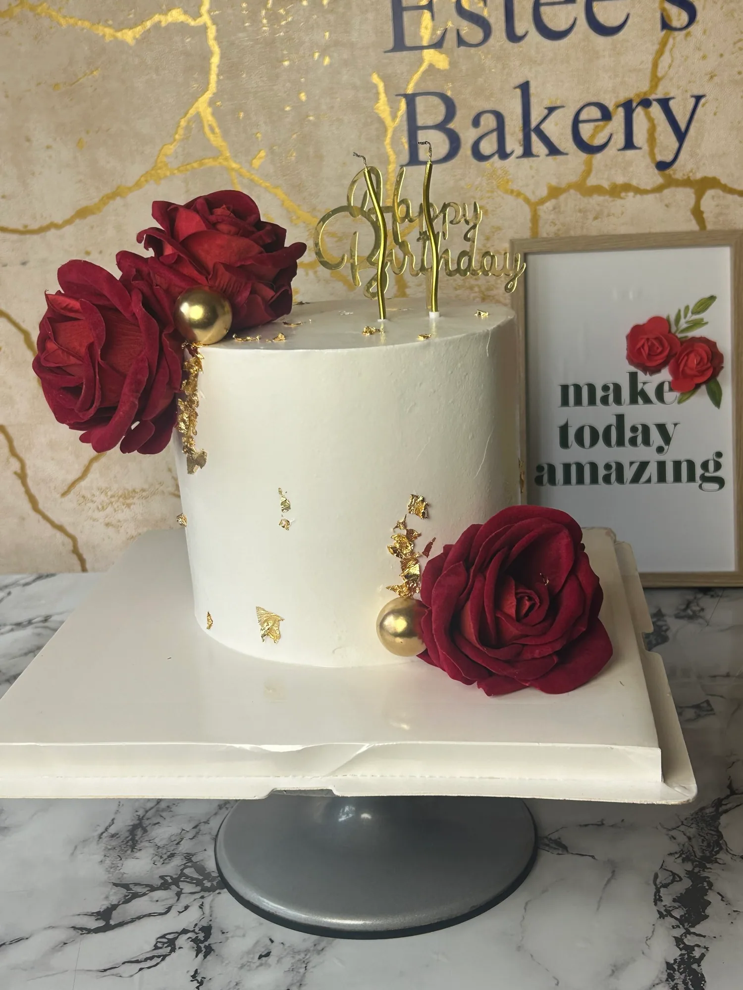 Rose-decorated birthday cake