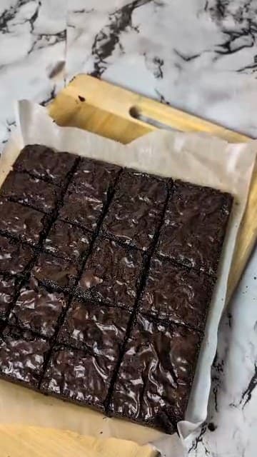 A tray of Estee’s brownies cut into squares